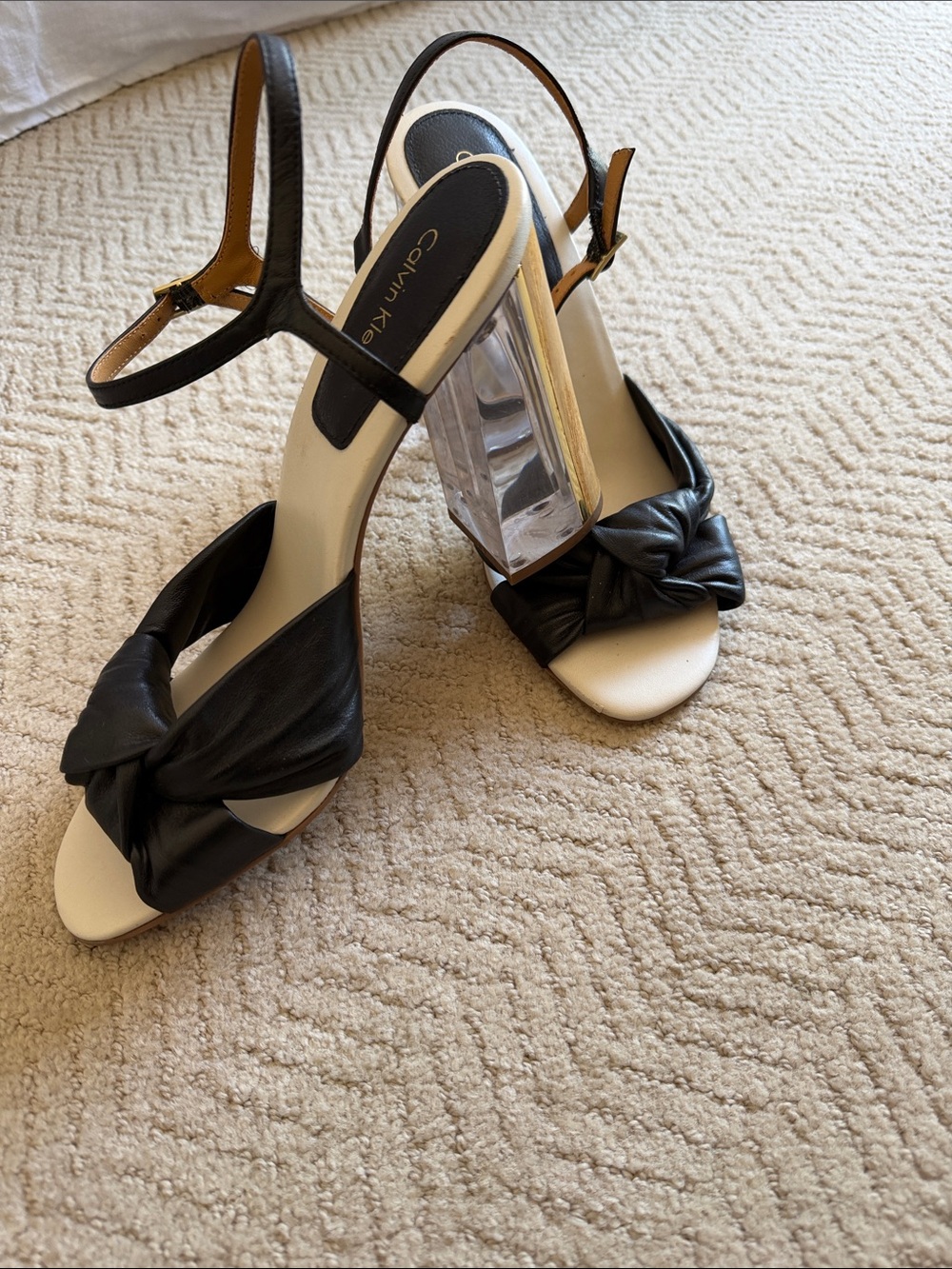 Calvin Klein Black Knotted Slingback Sandals with acrylic and wood block heel.